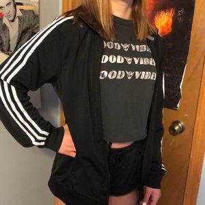 A men’s adidas zip up nylon jacket